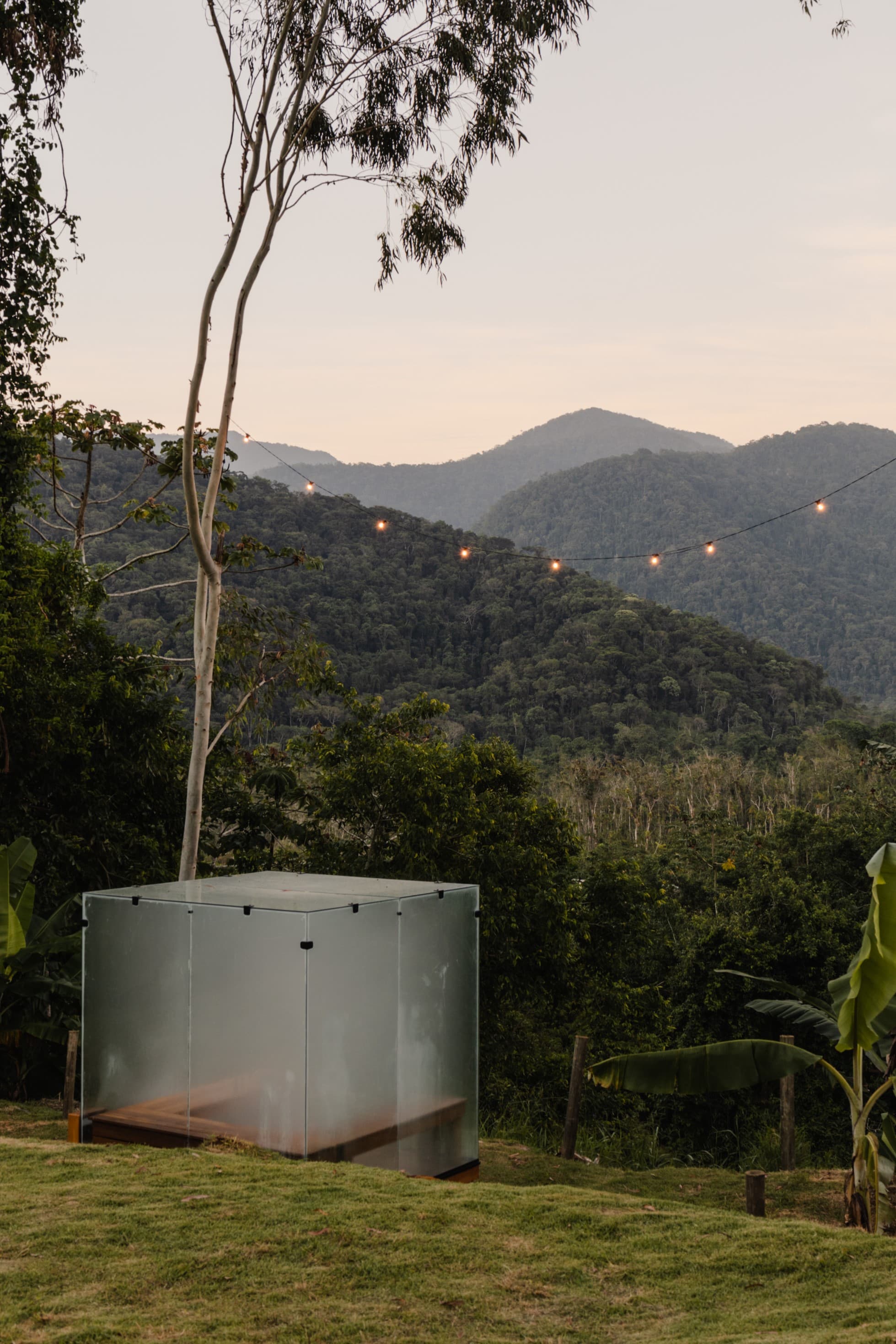 Glass sauna at Momento Itamambuca overlooking the Atlantic Forest